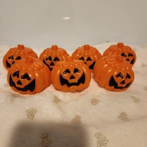 7 vintage orange pumpkin light covers.